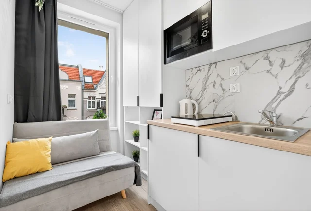 Modern room with bathroom in the city center on Jagiellońska Street. 